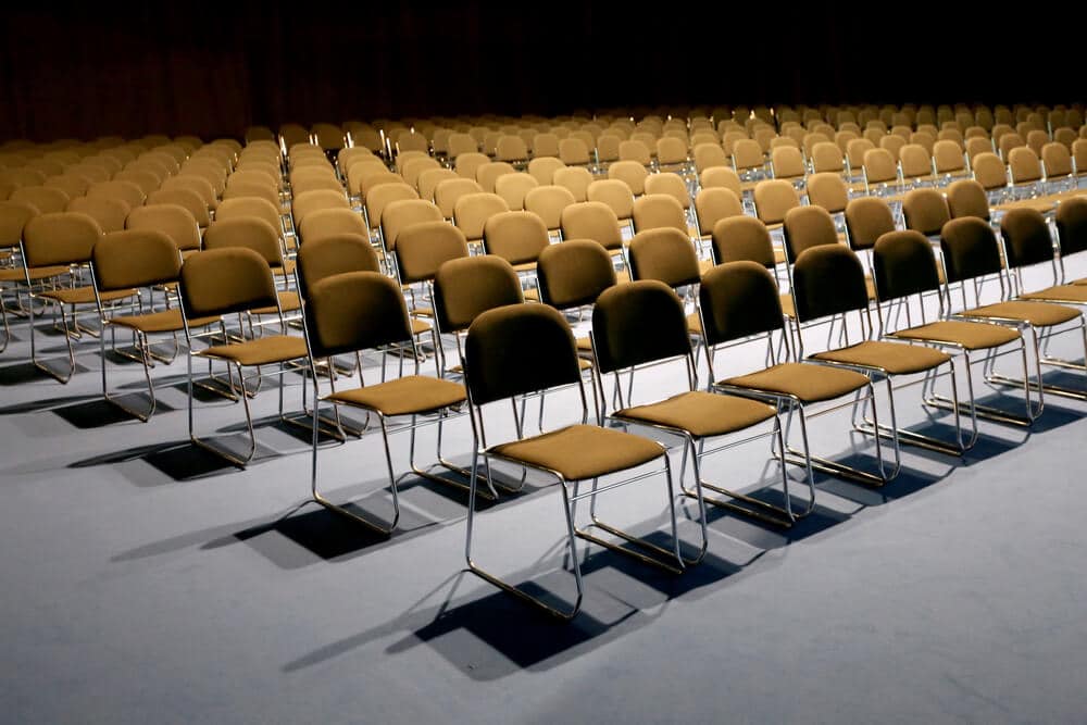 conference hall with empty chairs and no audience