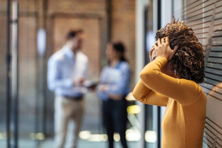 Employee at work reacting negatively in the workplace.